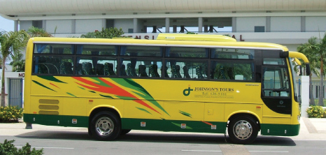 Johnson's Tours Bus Awaiting Passengers Outside Kensington Oval, Barbados Pocket Guide